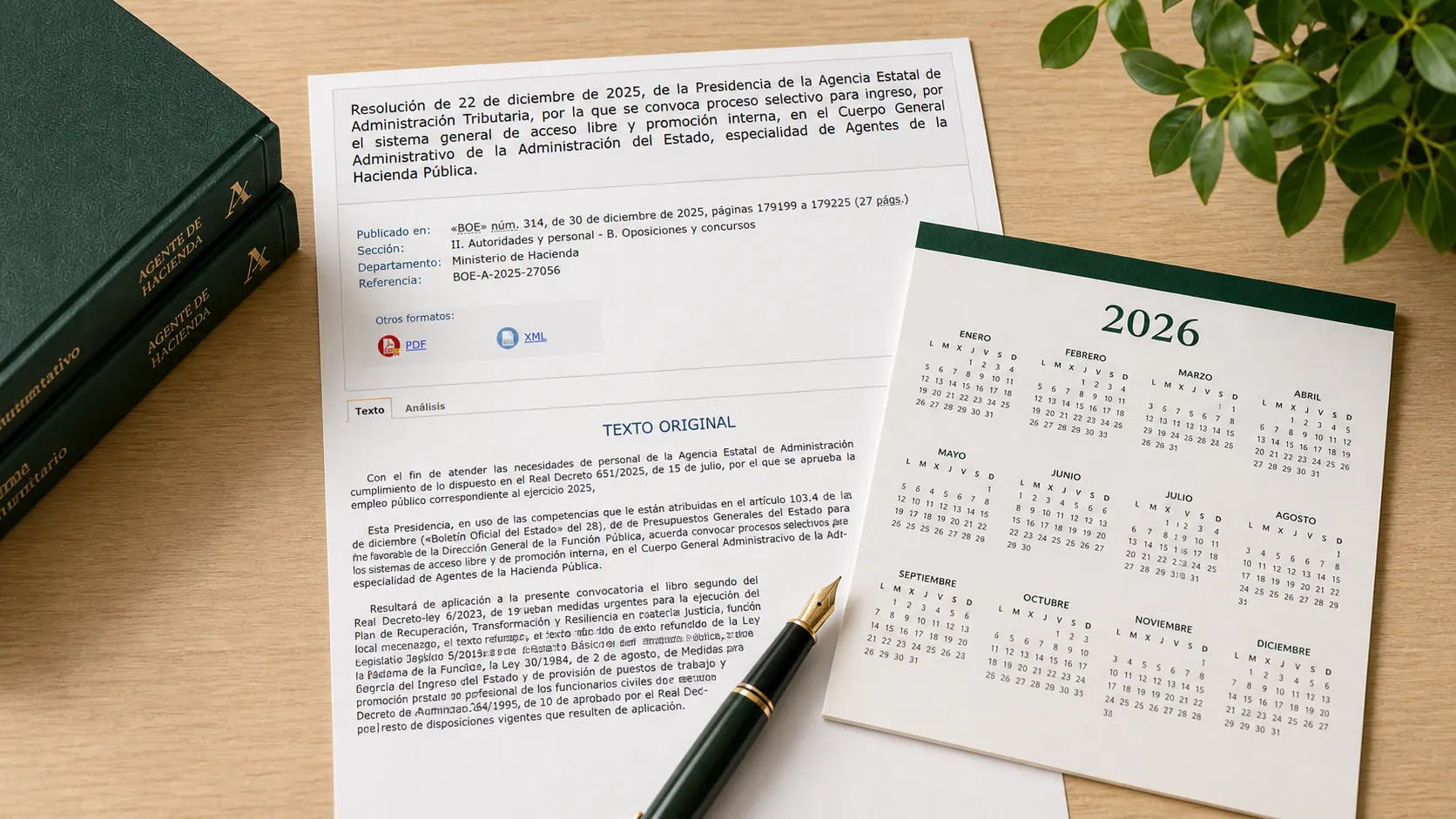 Convocatoria del BOE impresa con calendario de 2026, bolígrafo, planta y libros de estudio
